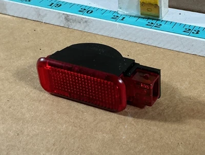 Panel de puerta trasera izquierda Audi A7 Quattro 2012-2018 lámpara reflectora de cortesía OEM Foto 1 de 4