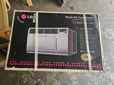 LG WINDW AIR CONDITION 11500 BTU ( LWHD1200FR ) Gray , MINT Condition.  - Image 1 of 4