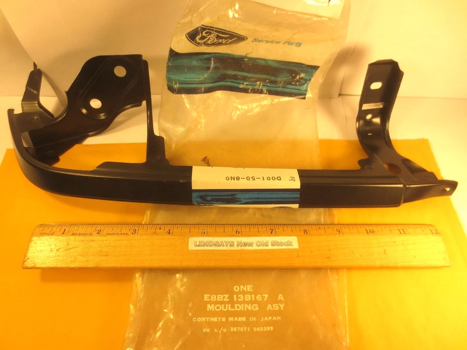 FARO INFERIOR IZQUIERDO FORD FESTIVA 1988 MOLDEADO ASI. NOS, E8BZ-13B167-A Foto 1 de 3