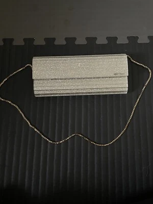 Bolso clutch Sweetie metálico degradado brillo plexi Foto 1 de 3