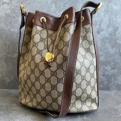 Lindo item Gucci GG padrão balde bolsa de ombro cordão marrom vintage - Imagem 1 de 4