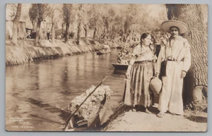RPPC Man Trajinero Boatman and Lady Trajineras Boats Xochimilco Mexico Yanez - Picture 1 of 4