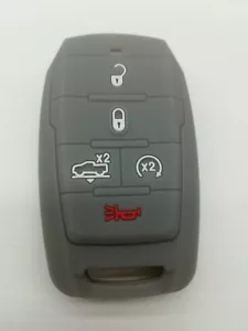 Cubierta de llave de llavero gris para 2019-2022 RAM 1500 Dodge OHT-4882056 68442909 68442909AB - Imagen 1 de 5