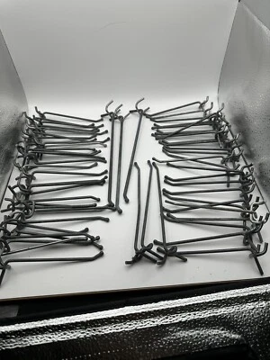63 pc Lot of 4 inch Peg Board Shelving, 1" wide Hooks 1/8" Board, Metal wire - Image 1 of 4