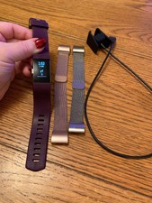 FITBIT CHARGE 2. Size medium/Large 3 Straps & Charger Included