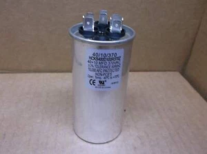 CONDENSADOR DE DOBLE FUNCIONAMIENTO REDONDO HARTLAND CONTROLS HCKS400D100R370Z 40+10 MFD X 370 VAC - Imagen 1 de 4