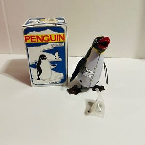 Rock and Roll Penguin Tin Litho Wind Up Toy Black 1980s Yellow Head