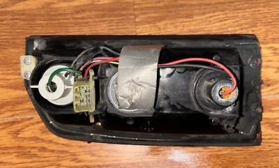 1990-1998 GEO TRACKER GENUINO OEM LÁMPARA TRASERA DERECHA LUZ TRASERA lado del pasajero Foto 1 de 2