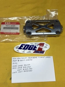 SUZUKI HANDLEBAR CLAMP 06-08 RM125 RM250, 05-07 RMZ450, 07 RMZ250 (56211-35G00) - Foto 1 di 3