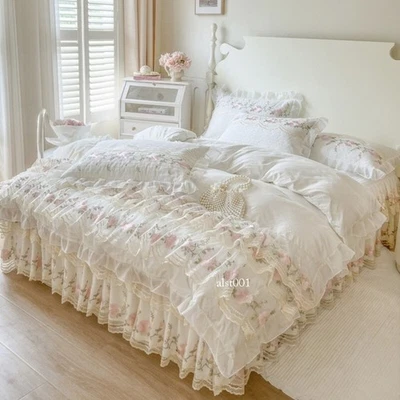 Juego de ropa de cama 3D flores 4 piezas algodón seda cama falda edredón funda 2 fundas de almohada Foto 1 de 4