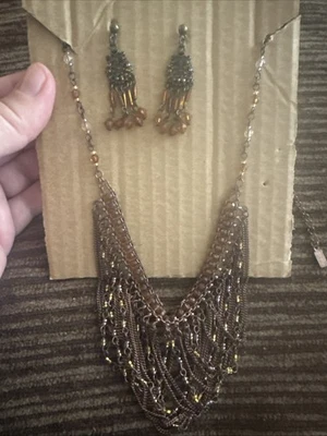 Collar y pendientes gargantilla firmados 1928 (marca) tono cobre/cuentas marrones Foto 1 de 4