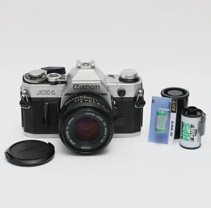 Canon AE-1 SLR 35mm Film Camera w/ FD 50mm F1.8 Bundle - Fully Film Tested USA - Picture 1 of 17