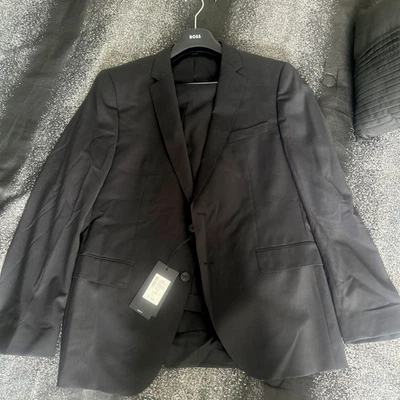Traje ajustado Hugo Boss para hombre 44R negro 2 botones tela Italia lana Reda  Foto 1 de 4