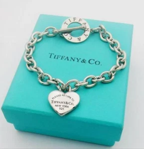 Bracelet Tiffany & Co avec étiquette cœur vierge à bascule en argent sterling Japon F/S - Photo 1/6