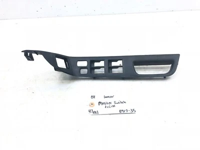 2008-2015 MITSUBISHI LANCER OEM FRONT LEFT DRIVER SIDE WINDOW SWITCH BEZEL - Image 1 of 4