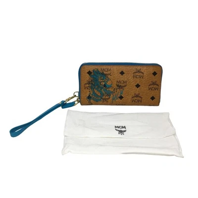 Cartera MCM 21 Flying Dragon Cremallera con Correa para Muñeca, Tamaño 3.9"x 7.9"x 0.8" Coñac/Azul Foto 1 de 4