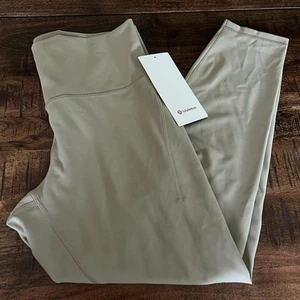 NUEVO CON ETIQUETAS Lululemon Talla 12 Wunder Train HR Apretado 25” *Bolsillos SHOK Roble Transparente Bronceado - Imagen 1 de 3