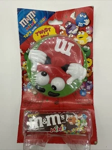 Grüne M&M's Minis selten Twist Me Eyes Spin Spender - Bild 1 von 2