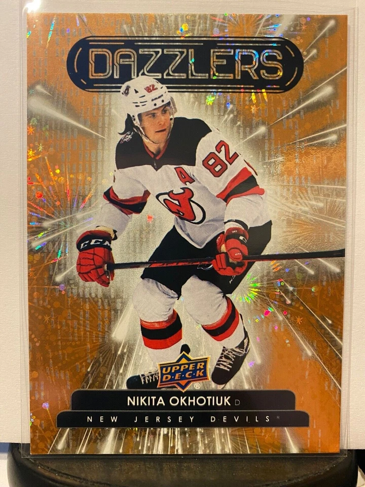 2022-23 Upper Deck Series 2 Orange Dazzlers Nikita Okhotiuk RC #DZ-59 Devils - Image 1 of 1