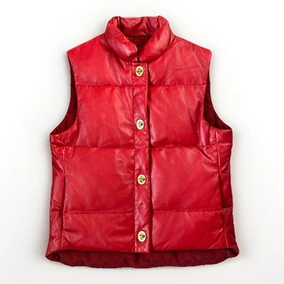 Chaleco acolchado Coach de cuero rojo con cierre giratorio herrajes dorados para mujer talla XS Foto 1 de 4