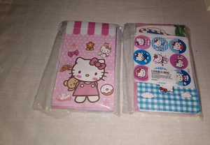 Zwei 12er Pack Hello Kitty Partytüten mit 18 Aufklebern Katze Mottoparty Papiersäcke  - Bild 1 von 4