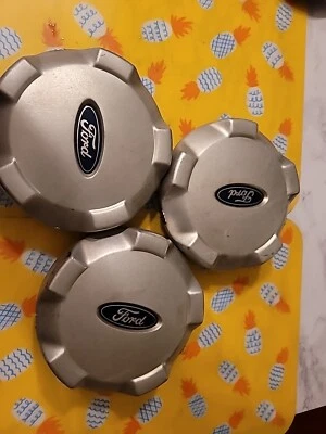 FORD ESCAPE OEM WHEEL CENTER CAP YL84-1A096-EB 2001 2002 2003 2004 2005 2006 - Image 1 of 4