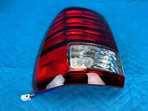 Lexus LX470 Rear Combination Tail Light Lamp Driver's (on body) 2006 2007 OEM - Picture 1 of 9
