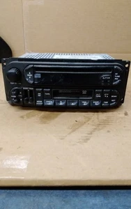 2005 DODGE CARAVAN SXT AM FM CD CASSETTE USED RADIO RAZ 22 AND 10 PIN - Picture 1 of 3