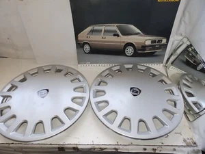 LANCIA DELTA LX DEL 82 - COPRICERCHI CON LOGO DISCO 14 PZ 02 - Foto 1 di 3