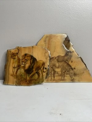 Cuadro vintage de leones y cebras en losas de mármol  Foto 1 de 4