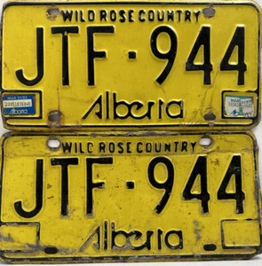 Lot Of 2 Vintage Wild Rose Alberta License Plates Yellow Black 1981/82 - Picture 1 of 18