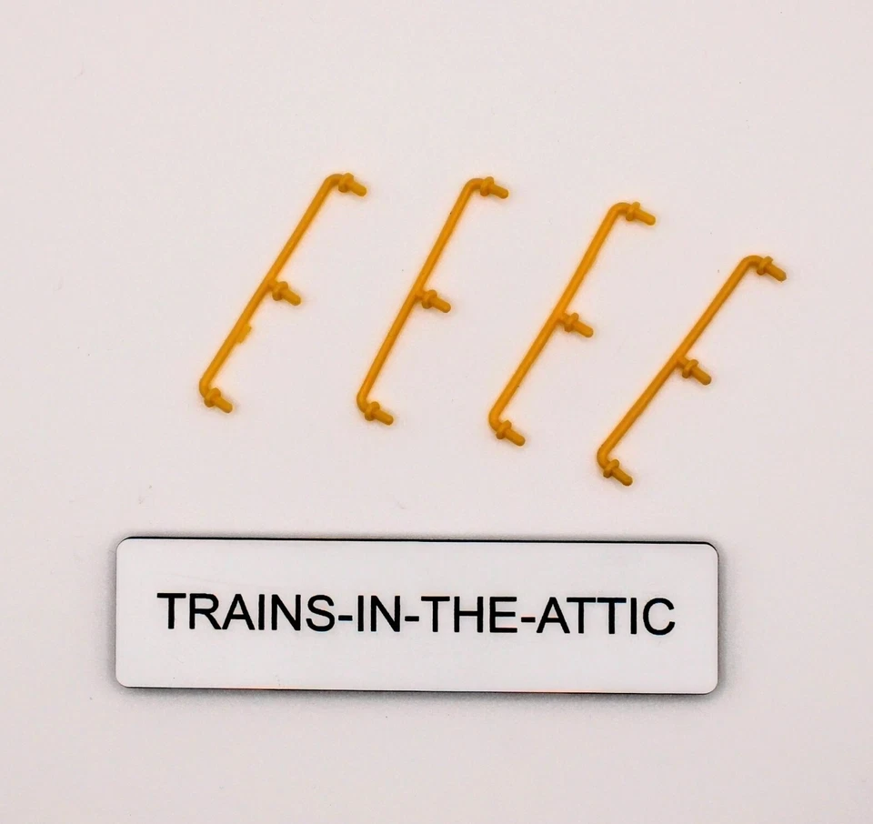 LIONEL 7605-55 HANDRAIL PACK OF (4) FOR 7605 CABOOSE . NEW YELLOW PLASTIC - Image 1 of 1