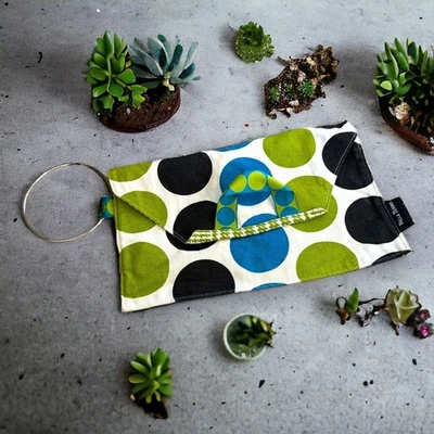 Bolso de muñeca Bella Tunno Oopsie Ditty bolsa de supervivencia sostiene toallitas pañal Foto 1 de 4