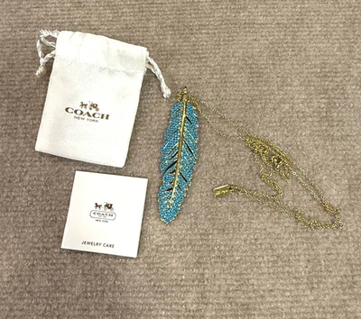 "Colgante Coach pluma/hoja con cuentas de color turquesa es de 4"" de largo oro occidental" Foto 1 de 4