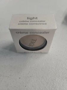TIGI creme Concealer LIGHT NIB 1.7g/.06oz - Picture 1 of 1