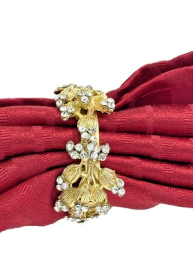 Anillos de servilleta de oro con brillante brillo en brotes y enredaderas florales grabados en oro Foto 1 de 4