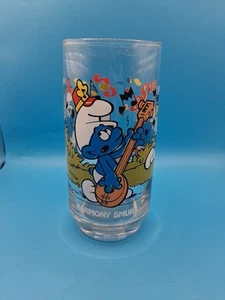 Bicchiere da bere Harmony Puffo 1983 PEYO Wallace Berrie & Co alto 6" - Foto 1 di 3