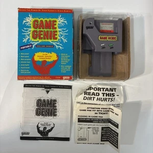 Nintendo Gameboy Game Genie Enhancer - Tested - Includes Code book & Inserts - Picture 1 of 10