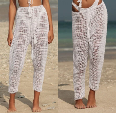 Sexy Pantalones de ganchillo a mano para mujeres Moda Flecos Pantalones cortos largos Ropa de playa Pantalones calientes Foto 1 de 4