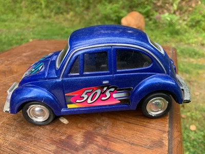 PLÁSTICO VW VOLKSWAGEN BESOURO DOURADO AZUL ANOS 50 AMOR - Imagem 1 de 4
