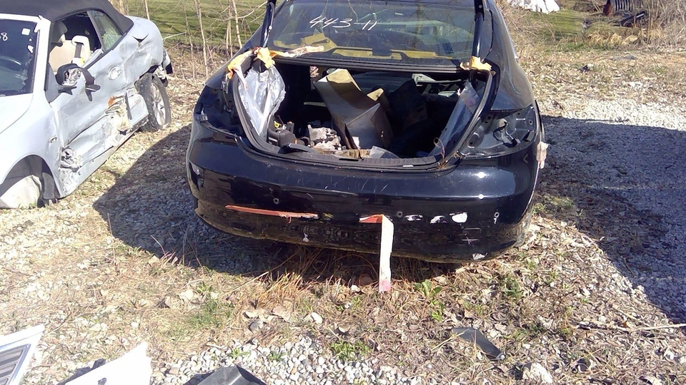 10 11 SAAB 9-5 Bumper Cover - Rear Exc. Aero; Park Assist 170 Black - Image 1 of 1