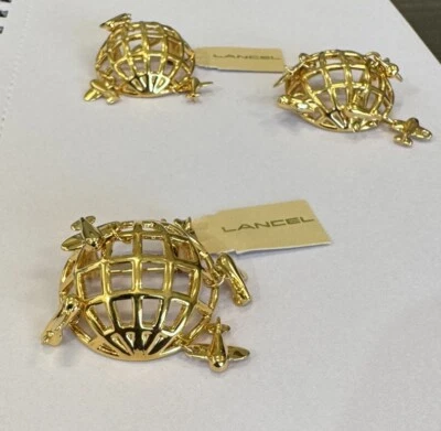 Juego de 3 broches de viaje Lancel dorados Foto 1 de 4