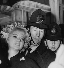 Showgirl Mandy Rice-Davies a witness Profumo Scandal is led awa- 1963 Old Photo