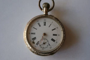 Orologio da tasca argento 800 mezzaluna e corona cilindro 10 rubini - Foto 1 di 6