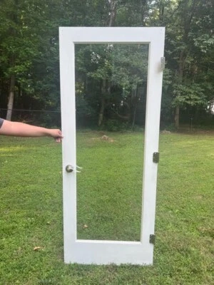 Puerta de madera con centro de vidrio, bisagras y perilla de puerta, 100$ OBO Foto 1 de 4