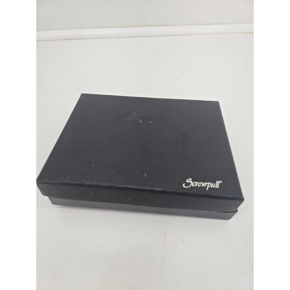 Le Creuset Screwpull Bomba Ahorradora de Vino Cromo Set Foto 1 de 4