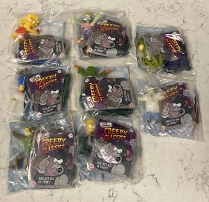 The Simpsons -  Lot Of 8 Burger King Creepy Classics Toys New Sealed - Picture 1 of 9