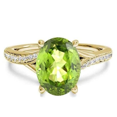 Anillo de compromiso bypass corte ovalado creado peridoto y diamantes enchapado en oro de 14K 3,50 quilates Foto 1 de 4