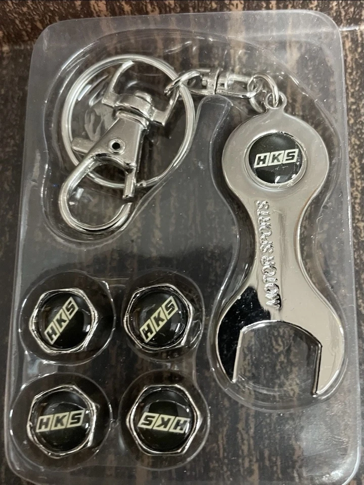 Juego de llaveros HKS con tapas de vástago de válvula y llave Foto 1 de 1