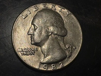 Rare 1982 D Quarter.  Major Error! "D" Mint Mark filled" IN GOD. WE TRUST COD  - Image 1 of 4